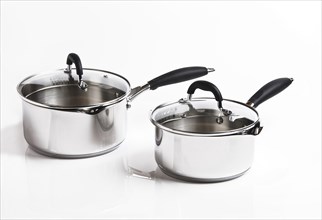 Two stainless steel saucepans