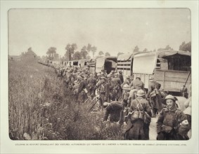 Trucks and soldiers of reinforcement convoy heading for the battlefield in Flanders during the First World War