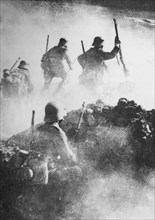 German WWI stormtroopers advance through clouds of smoke towards enemy positions on the Western Front during the Spring Offensive of 1918