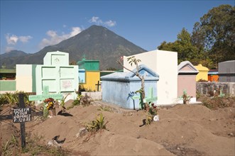 Colorful tombs in a cemetery on the shores of Lago de Atitlan