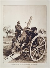 Artillery soldiers shooting with anti-aircraft gun in Flanders during the First World War