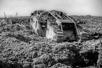 British WWI Mark IV male tank bogged down in the mud near Clapham Junction