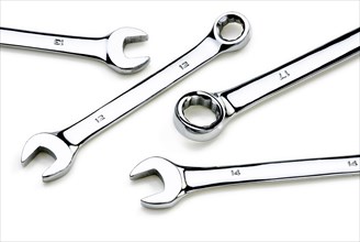 Open ended and ring spanners on a white background