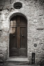 Doorway along cobbled street