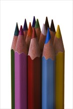 Coloured pencils standing in a column