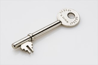 Shiny chromium plated door key