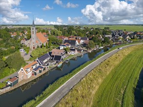 Aerial view of the village of Ursem and the Schermerdijk