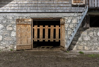 Wooden gate at the cowshed