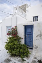 House facade with blue entrance door