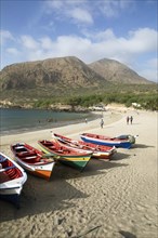 Colourful fishing boats on the beach or Praia Areia Branca