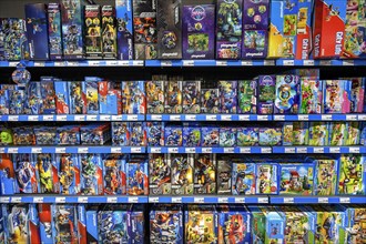 Shelf with Playmobil system toys in the wholesale market