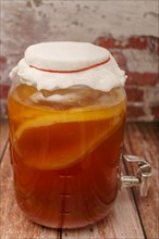 Glass jar with homemade kombucha