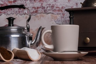 Coffee cup with milk jug