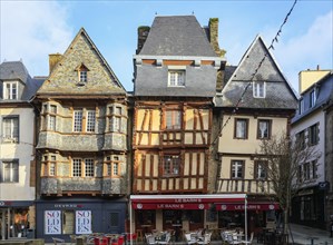 Half-timbered houses clad in slate on the Place du General Leclerc