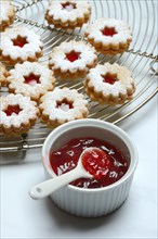 Christmas biscuits and bowl of redcurrant jelly