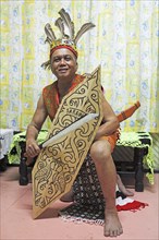 Malaysian man in a traditional dance dress