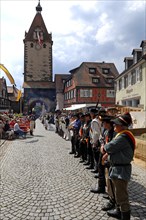Parading off the guard of the Civic Guard Association at a festival in Gengenbach