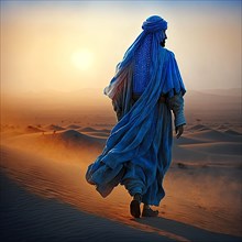 Desert landscape with a berber dressed in blue with pilgrims at dawn