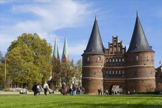 Tourists in front of the Holsten Gate