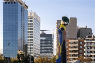 Barcelona cityscape with office and apartment buildings and sculpture of Miro