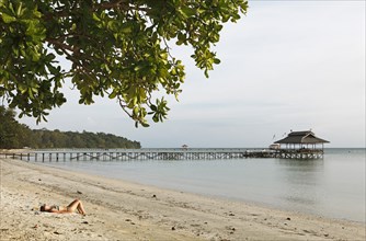 Beach and jetty on Pulau Tiga Island or Survivor Island