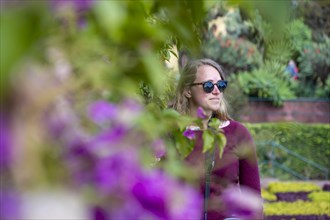 Woman with sunglasses in nature