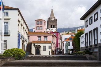 Small square in the old town with colourful houses and chapel Capela de Santo Antonio de Mouraria