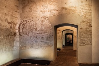 Cells with graffiti of the prisoners