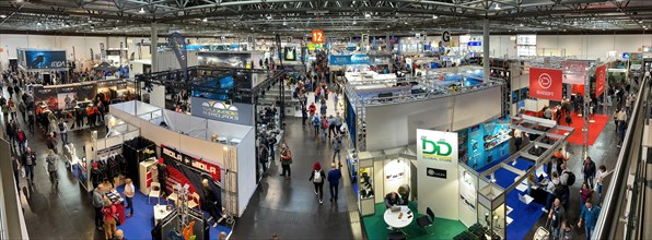 Panoramic photo of exhibition hall water sports fair boot