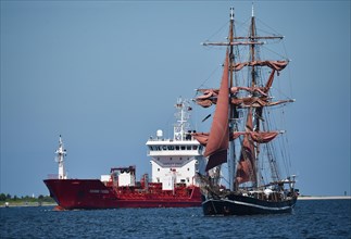 Sailing ship and tanker in the Kiel Fjord