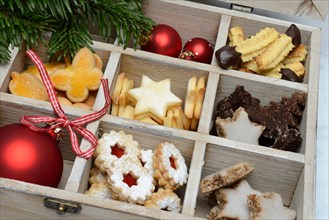 Assorted Christmas biscuits in fanned wooden box