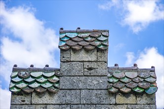 Architectural detail stepped gable with tile roofing