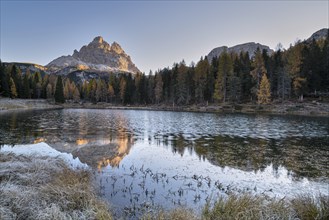 Frosty Lago Antorno with Three Peaks in autumn