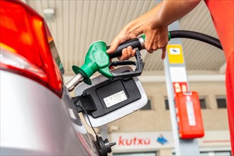 Refueling gasoline or diesel at the gas station in the fuel crisis due to high prices