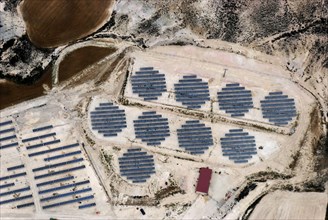 Aerial view of a solar farm in the form of a solar cell