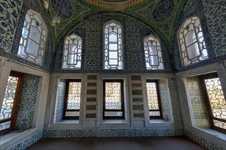 Ornate windows and mosaics in the private chamber of Sultan Ahmed I