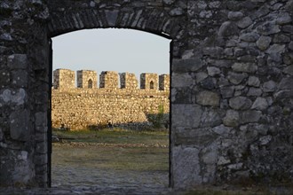Walls of Rozafa castle ruins in the evening light