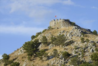 Rozafa Castle with Albanian flag