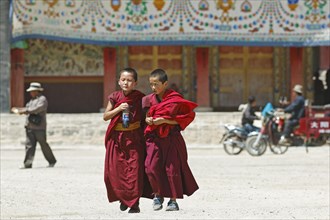 Novices in shamtab and trainers at Labrang Tibetan Monastery