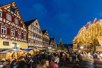 Market stalls at the Christmas market in the old town with half-timbered houses