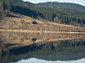 Reflection of the Krummenbachhof in Schluchsee