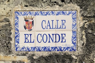 Street name Calle el Conde made of tiles