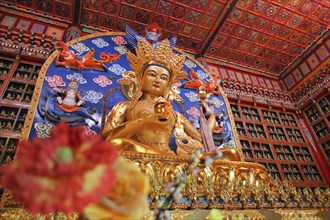 Golden Buddha statue at Tseway Monastery