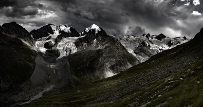 Summit of the Bernina Group with dramatic clouds