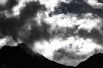 Cable car to Piz Murtel with dramatic clouds
