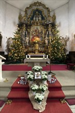 Altar of the late Baroque St Bartholomews Church decorated for Christmas