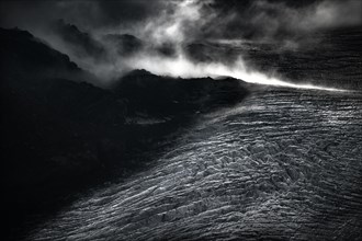 Bernina Group with Rosegg Glacier and dramatic clouds at blue hour