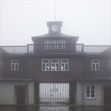 Gate to the beech forest concentration camp in the fog