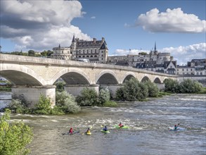 Marechal Leclerc Bridge on the Loire with kayakers and in the background the Renaissance castles of Amboise