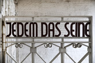 Entrance gate to beech forest concentration camp with the saying Jedem das Seine
